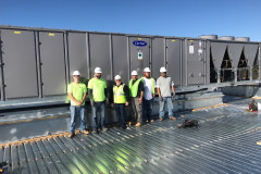 CAS team after the successful installation of two 110-ton Packaged Rooftop Units in Malden, MA.