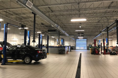 Spiral duct installed for a 10-ton rooftop unit serving an automotive service center in Braintree, MA.