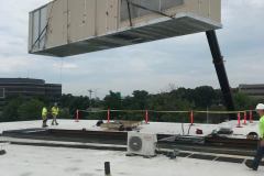 Rig of a 110-ton Packaged Rooftop Unit for a shared office/retail space in Wilmington, MA